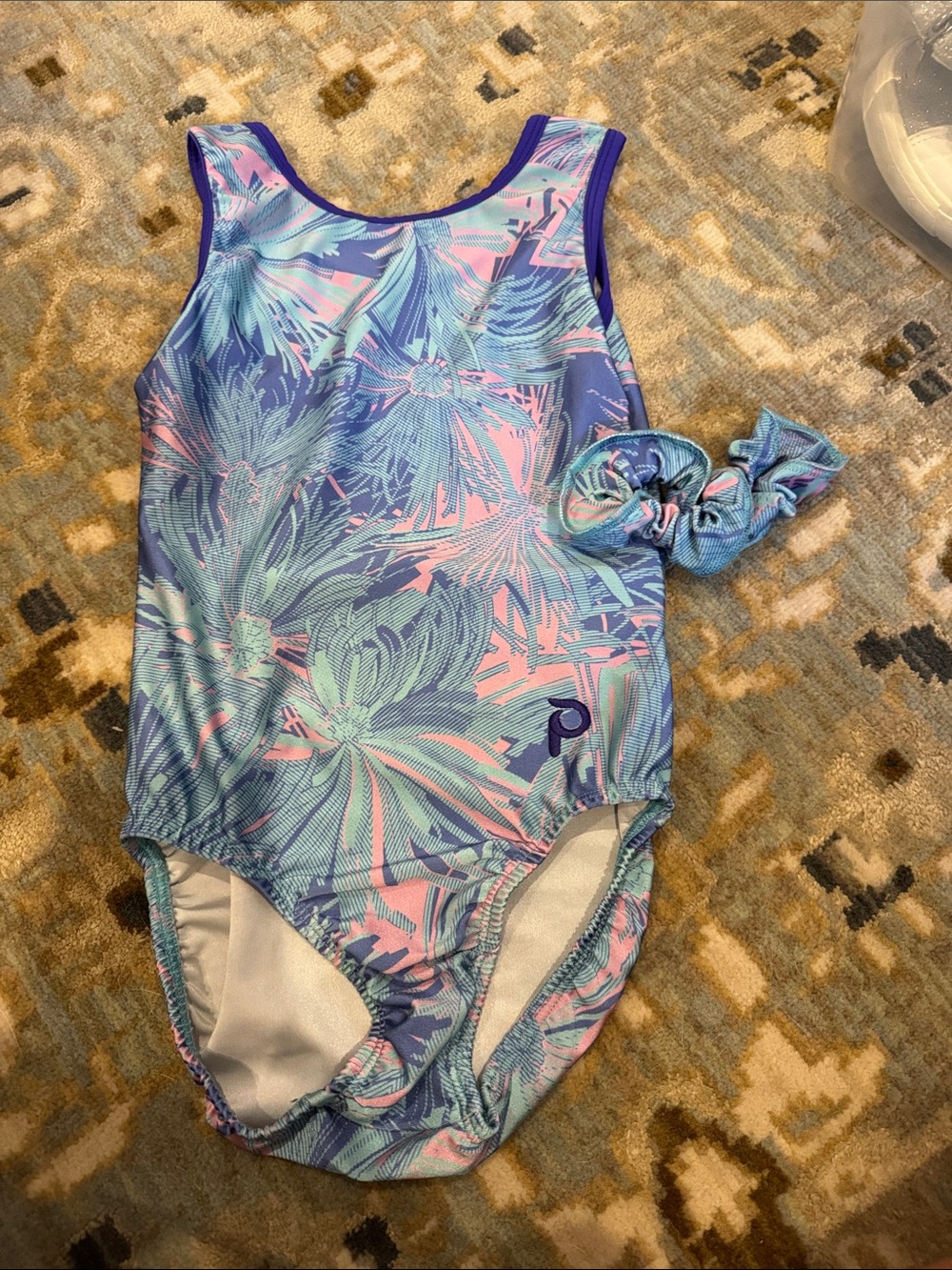 Child large plum gymnastics leotard with matching scrunchie worn once